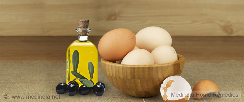 Apply Egg and Olive Oil to Hair Apply Egg and Olive Oil to Hair