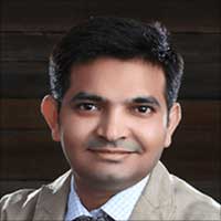 Dr. Atish Bakane